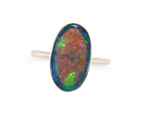 A BLACK OPAL RING set with an oval cabochon black opal, no assay marks, size M1/2 / 6.5, 2.5g. 