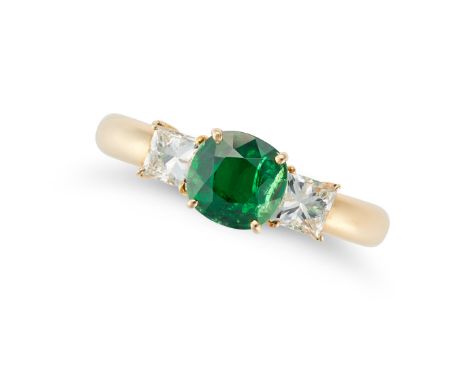 A TSAVORITE AND DIAMOND THREE STONE RING set with a cushion cut tsavorite garnet of 1.48 carats accented on each side by a pr