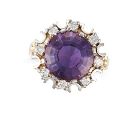 AN AMETHYST AND DIAMOND DRESS RING set with a round cut amethyst accented by round brilliant cut diamonds, stamped 585, size 