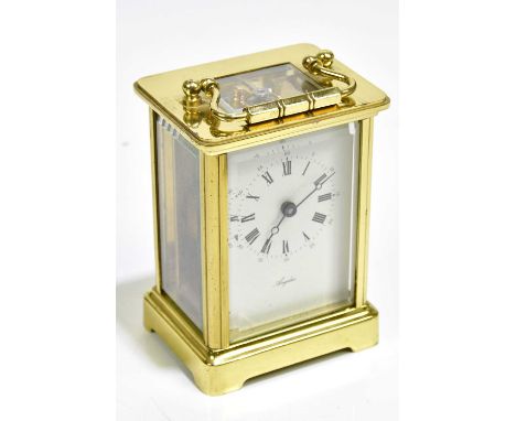 ANGELUS; a brass cased carriage clock, with white dial set with Roman numerals, height 11cm.