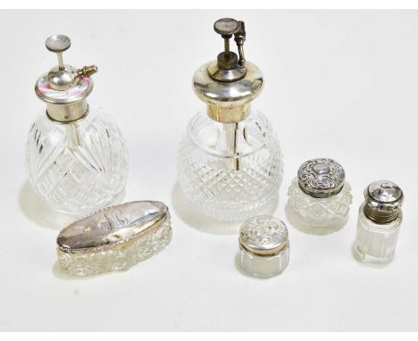 A group of six various hallmarked silver cut glass dressing table items to include a trinket box and a perfume bottle.