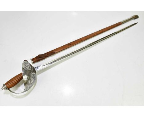 A 1912 pattern cavalry officer's sword with metal mounted leather scabbard, overall length 113cm.Condition Report: Scuffing a