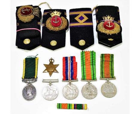 A quantity unnamed WWII medals plus a Territorial Efficiency Medal named to Pte R. Stockton Cheshire Regt, also a quantity of