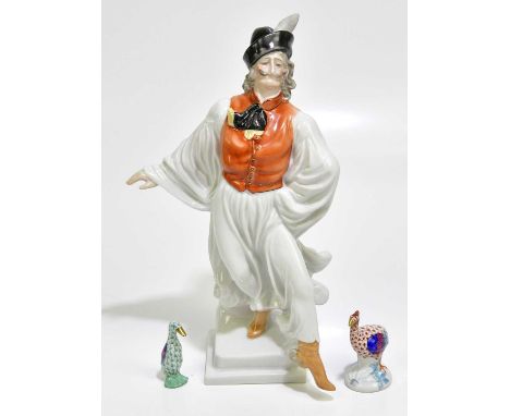 HEREND; a model of a cavalier, height 30cm, together with a Herend porcelain model of a duck and a peahen, each with fish net