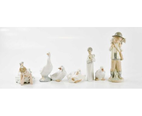 NAO; a group of seven figures to include four ducks, a cherub, a ballerina and a shepherd boy, largest 25cm.