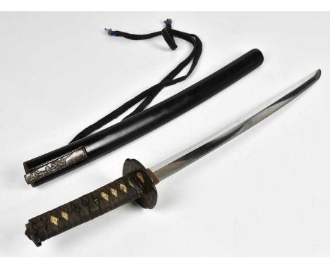 A Japanese Wakizashi sword, the shagreen grip with applied Menuki, above the Tsuba decorated with clouds, length of blade 43c