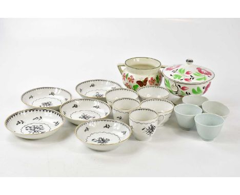 A ten piece 19th century part tea service with black painted floral decoration, with a late 19th century twin handled cauldro