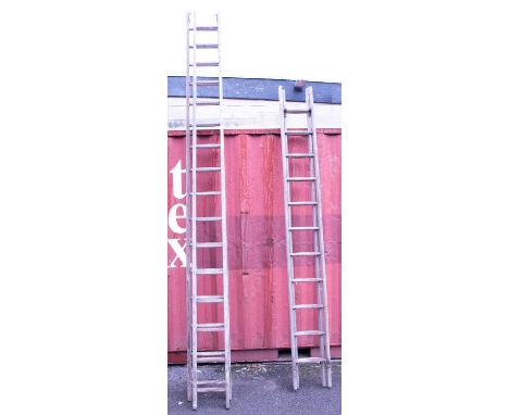 A large pair of wooden extending step ladders and a similar smaller pair (to be sold for decorative use only) (2).