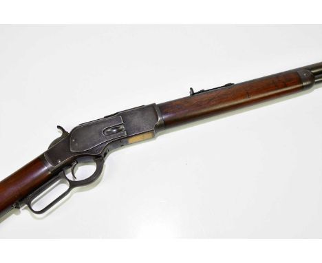  ***SECTION 1 FIREARMS LICENCE REQUIRED***WINCHESTER; an 1873 model .44 WCF under lever repeating rifle, with 23.5" barrel an