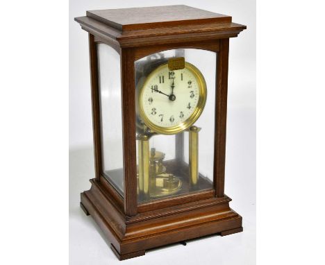 GUSTAV BECKER; a four glass mantel clock, the dial set with Arabic numerals, height 32cm.