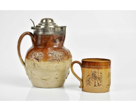 A 19th century salt glazed jug with hallmarked silver rim and cover, relief decorated with hunting and tavern figures, the ri