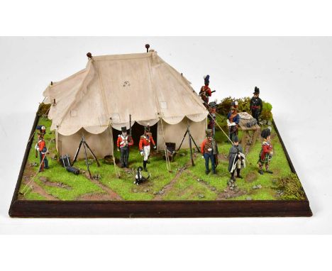 A model of Wellington's camp at Waterloo, length 34cm.Condition Report: Damage to tent, dirty and dusty.