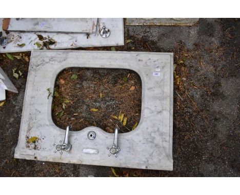 A marble washstand and basin, 85cm x 64cm.