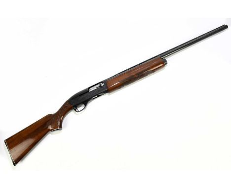  ***SECTION 2 SHOTGUN LICENCE REQUIRED***REMINGTON; a Model 1100 twelve bore three shot semi-auto shotgun, the 28" barrel wit