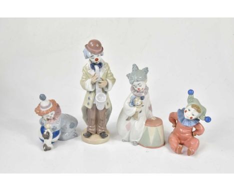 LLADRO; three assorted figures to include a clown playing saxophone, height 23cm, together with a Nao seated clown, height 13