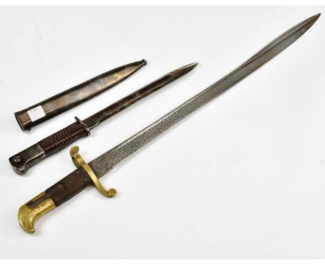 A 19th century British bayonet with brass handle and leather grip, overall length 72cm, with a further bayonet and scabbard (