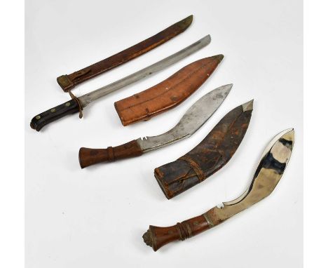 A WWII British army Gurkha issue kukri dated 1945 on the scabbard and 1944 on the blade, together with a further kukri knife 