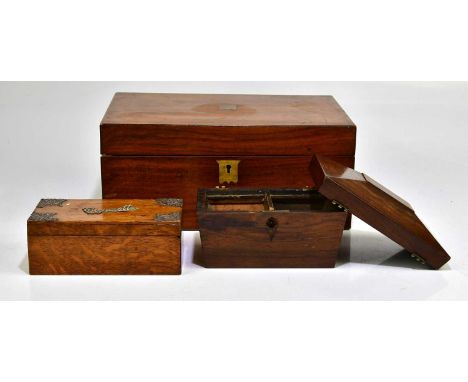 A 19th century mahogany writing slope, together with a 19th century rosewood tea caddy and an oak cigarette box.Condition Rep