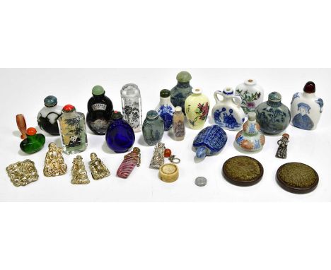 A collection of decorative Chinese snuff bottles to include a novelty example in the form of a turtle, a Chinese model of Bud