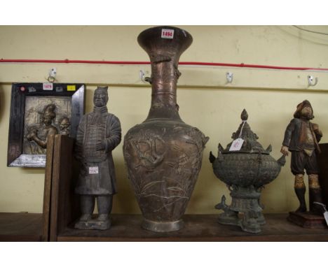 Three eastern items,&nbsp;comprising a large Japanese bronzed metal vase, 50.5cm high; a&nbsp;Burmese&nbsp;vase and cover; an