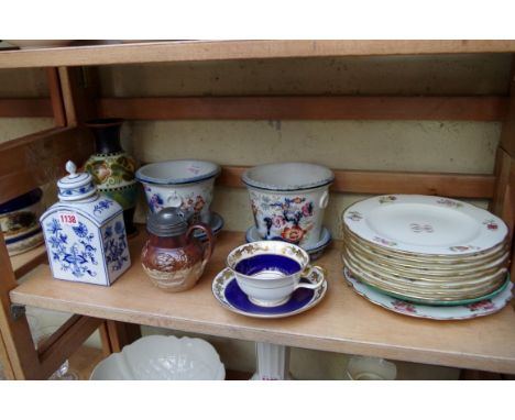 A mixed group of English and Continental porcelain,&nbsp;to include a pair of cache pots and stands; a Gouda pottery vase, 20