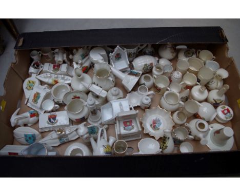 A quantity of crested china, to include a Grafton grenade; an Arcadian submarine; a Carlton ware submarine; and a Goss Longsh