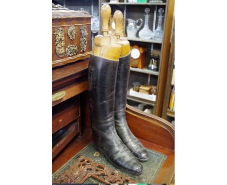 A pair of vintage black leather riding boots,&nbsp;approx size 8, with wooden trees.&nbsp;&nbsp; 