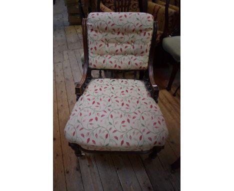A Victorian walnut and button upholstered hall chair. 