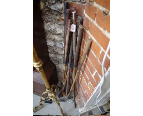 A collection of twelve vintage golf clubs.&nbsp; 