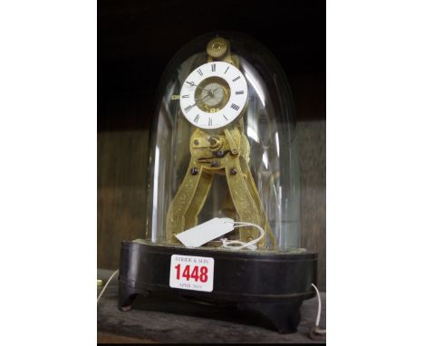 A 19th century brass skeleton clock, the 5.5cm enamel chapter ring inscribed 'Pierret, a Paris', with alarm and pull repeat, 