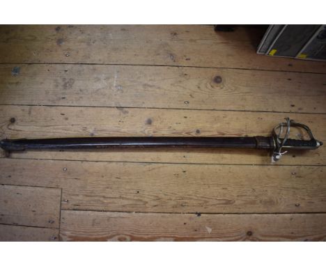 A cavalry sword with leather scabbard,&nbsp;the blade inscribed 1517, with shagreen grip. 
