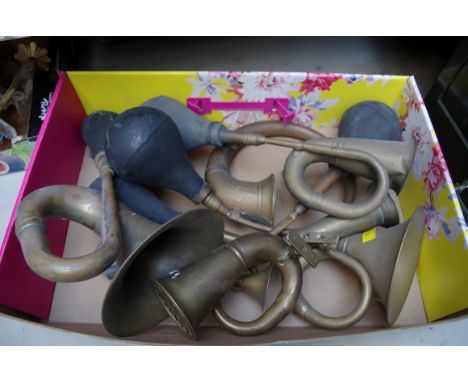 A collection of seven vintage brass motoring horns.&nbsp; 