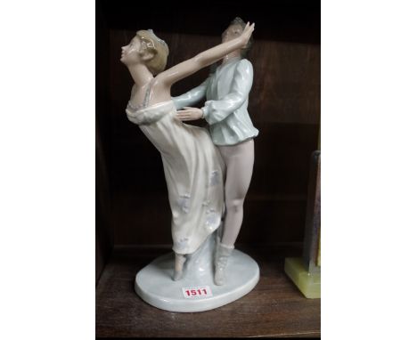 A Nao porcelain figure group of a dancing couple,&nbsp;31.5cm high. 