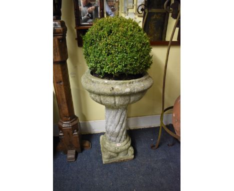 An old weathered stone pedestal planter,&nbsp;87cm high.&nbsp; 