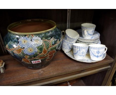 A Royal Doulton stoneware jardiniere,&nbsp;18.5cm high; together with a Victorian porcelain part tea service. 