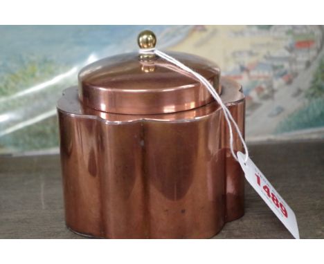 An early 20th century copper tea caddy and cover,&nbsp;by Joseph Heinrichs, with brass finial, 9cm high. 