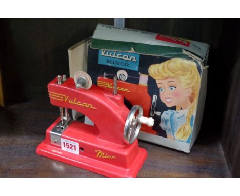 A vintage Vulcan Minor child's sewing machine,&nbsp;boxed.&nbsp; 