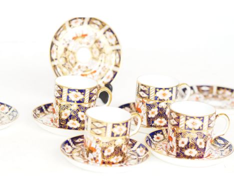Royal crown derby coffee cans(4) &amp; 7 saucers Imari 2451 pattern, Hairline to 1 can