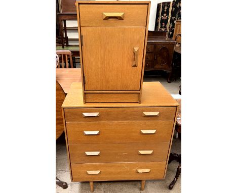 A Mid 20th century Stag light oak four drawer chest together with a matching bedside cabinet 