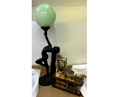 An Art Nouveau inspired table lamp in the form of a nude figure with flowing hair together with a brass coal mining diorama