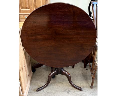 A 19th century mahogany tripod table, with snap action