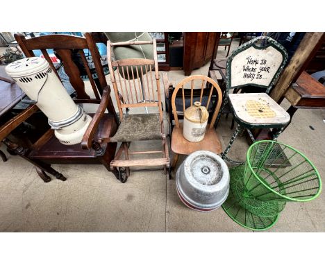 A paraffin heater together with a commode, invalid chair, childs chair, stoneware flagon, beer barrel, green metal basket and