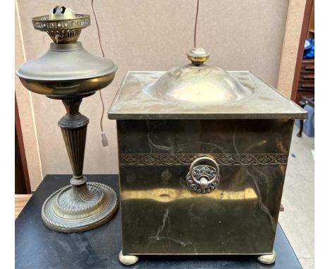 A brass oil lamp together with a brass coal box 