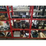 +VAT Contents of 4 red racks comprising of a variety of coin counters, plastic cup dispensers, a