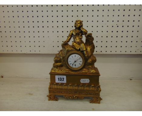 A brass mantle clock