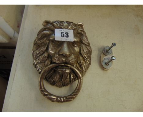 A Lion door knocker and part