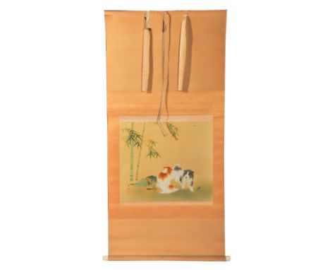 Japanese scroll two puppies playing beside bamboo, red seal signatures, 20th Century, 43cm x 51cm