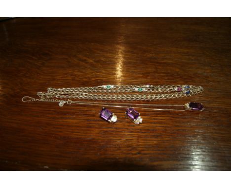 Suite of Christian Dior jewllery including a necklace, a pendant, chain and earrings, all with hardstone decoration