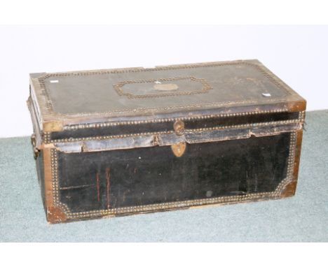 George III brass bound and studded trunk with carrying handles to each end, initalled FB to top, 32cm high, 75cm wide
