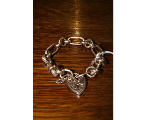 9ct gold chain of fancy link form with 9ct gold padlock clasp, 38 grams